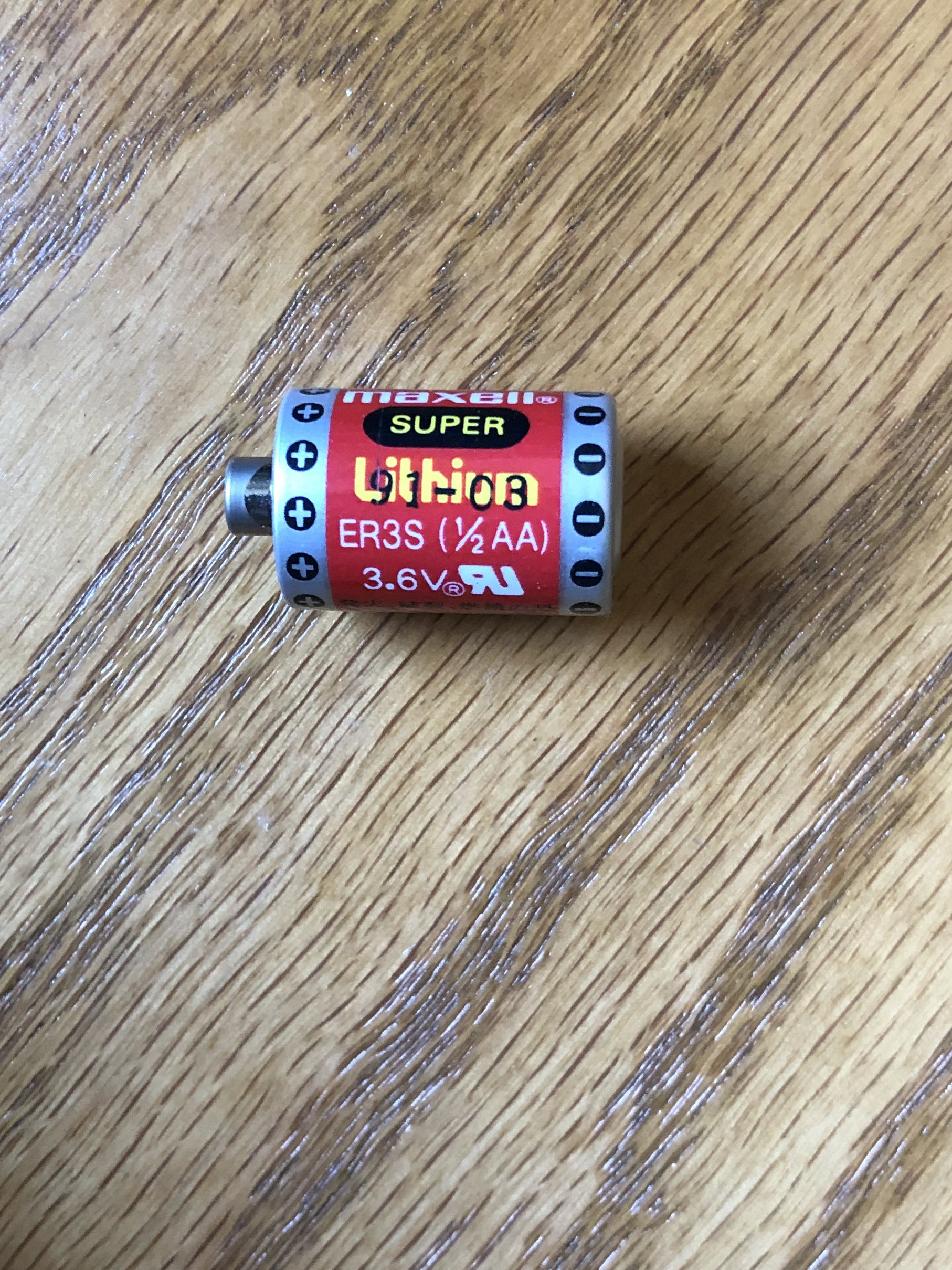 A rare intact Maxell battery with a date code of March 1991 intact maxell battery
